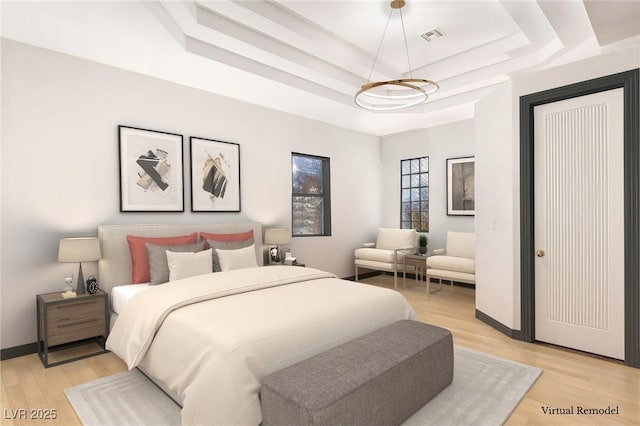 60 Innisbrook Ave, Las Vegas, NV 89113 - bedroom featuring a tray ceiling, light wood finished floors, and baseboards
