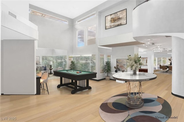 60 Innisbrook Ave, Las Vegas, NV 89113 - game room featuring a towering ceiling, pool table, wood finished floors, and ceiling fan