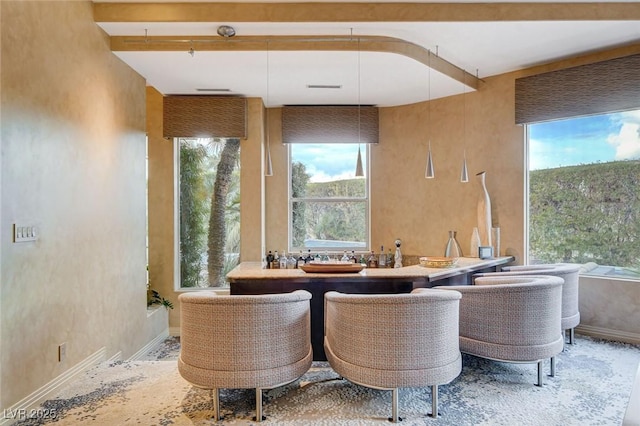 60 Innisbrook Ave, Las Vegas, NV 89113 - bathroom featuring plenty of natural light, baseboards, beamed ceiling, and double vanity