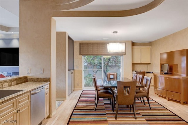 60 Innisbrook Ave, Las Vegas, NV 89113 - dining area with light wood-style flooring, a chandelier, and baseboards
