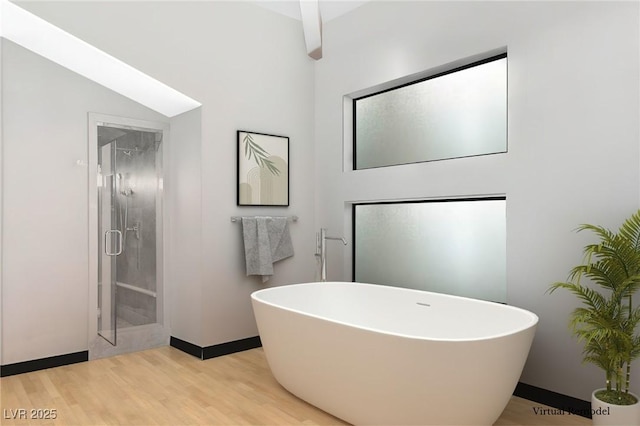 60 Innisbrook Ave, Las Vegas, NV 89113 - full bathroom with a freestanding bath, wood finished floors, a shower stall, and baseboards