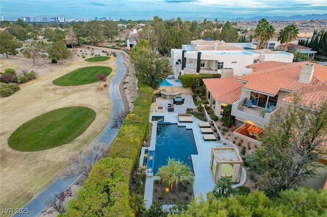 60 Innisbrook Ave, Las Vegas, NV 89113 - aerial view of residential area featuring a pool area and a mountain backdrop