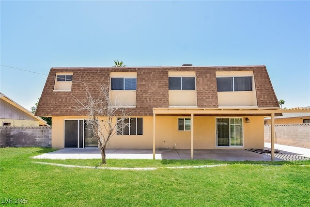 2614 Capistrano Ave, Las Vegas, NV 89121 - back of property featuring a shingled roof, a patio, and mansard roof