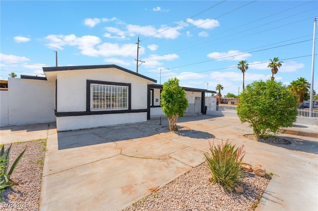 517 N 22nd St, Las Vegas, NV 89101 - view of front of house featuring stucco siding and concrete driveway