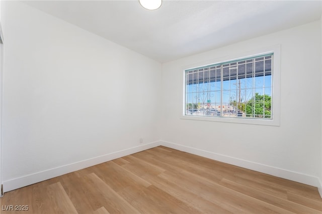 517 N 22nd St, Las Vegas, NV 89101 - spare room with baseboards and light wood-style flooring
