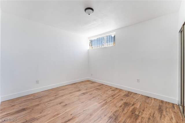 517 N 22nd St, Las Vegas, NV 89101 - unfurnished room featuring baseboards and light wood-style floors