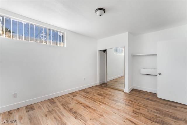 517 N 22nd St, Las Vegas, NV 89101 - unfurnished bedroom featuring baseboards, wood finished floors, and a closet
