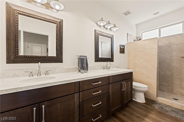 1309 Vista Del Monte Dr, Mesquite, NV 89027 - full bath with toilet, double vanity, walk in shower, and wood finished floors