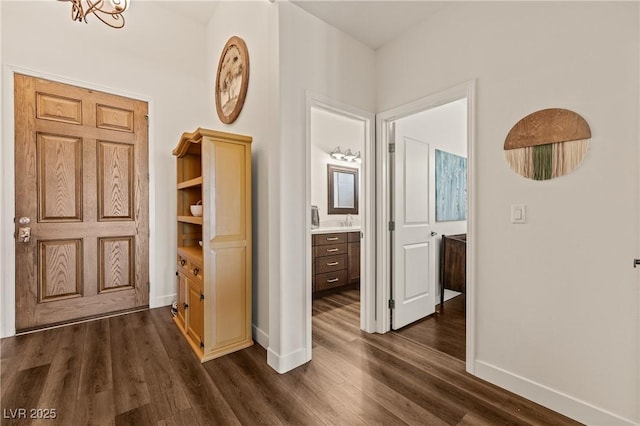 1309 Vista Del Monte Dr, Mesquite, NV 89027 - hall featuring baseboards, dark wood finished floors, and a sink