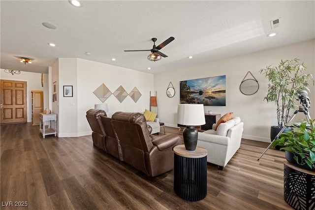 1309 Vista Del Monte Dr, Mesquite, NV 89027 - living room featuring dark wood-style flooring, ceiling fan, recessed lighting, and baseboards