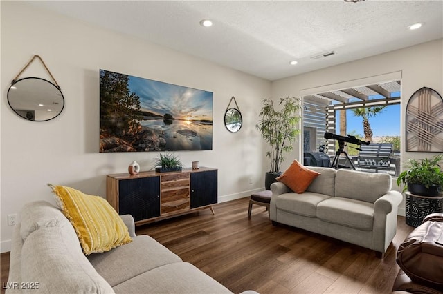 1309 Vista Del Monte Dr, Mesquite, NV 89027 - living area featuring wood finished floors, baseboards, recessed lighting, and a textured ceiling
