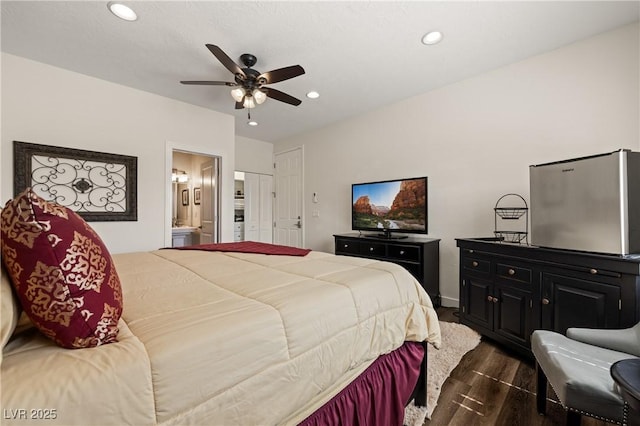 1309 Vista Del Monte Dr, Mesquite, NV 89027 - bedroom with dark wood-style flooring, recessed lighting, connected bathroom, and a ceiling fan