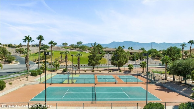 1309 Vista Del Monte Dr, Mesquite, NV 89027 - view of tennis court featuring a mountain view and community basketball court
