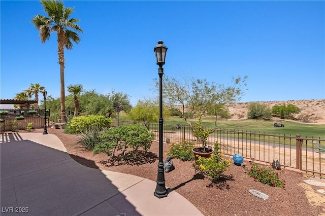 1309 Vista Del Monte Dr, Mesquite, NV 89027 - view of property's community with a patio