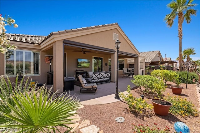 1309 Vista Del Monte Dr, Mesquite, NV 89027 - rear view of property featuring a patio area, stucco siding, ceiling fan, and a tile roof