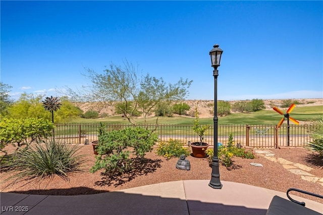 1309 Vista Del Monte Dr, Mesquite, NV 89027 - view of patio / terrace with view of golf course
