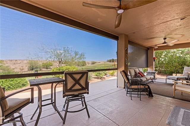 1309 Vista Del Monte Dr, Mesquite, NV 89027 - view of patio with a ceiling fan and outdoor lounge area