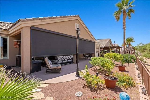 1309 Vista Del Monte Dr, Mesquite, NV 89027 - view of property exterior featuring a patio area and stucco siding