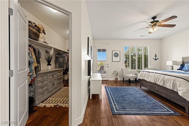 1309 Vista Del Monte Dr, Mesquite, NV 89027 - bedroom featuring access to exterior, dark wood-style flooring, baseboards, and ceiling fan
