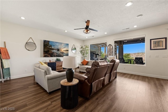 1309 Vista Del Monte Dr, Mesquite, NV 89027 - living area featuring dark wood finished floors, recessed lighting, a ceiling fan, a textured ceiling, and baseboards