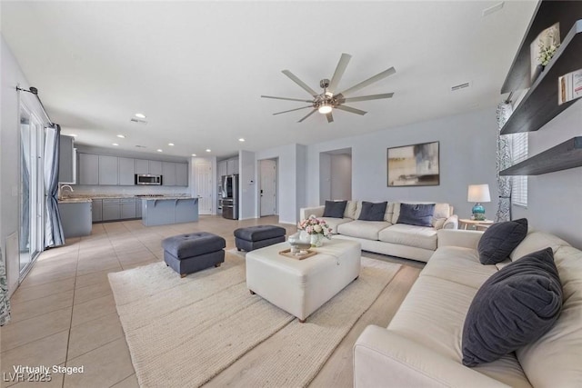 10373 Northern Hills Ave, Las Vegas, NV 89166 - living room with ceiling fan, light tile patterned floors, and recessed lighting