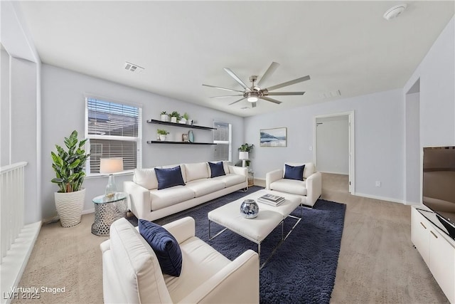 10373 Northern Hills Ave, Las Vegas, NV 89166 - living room featuring ceiling fan and baseboards