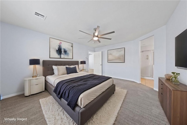 10373 Northern Hills Ave, Las Vegas, NV 89166 - carpeted bedroom with ceiling fan and connected bathroom