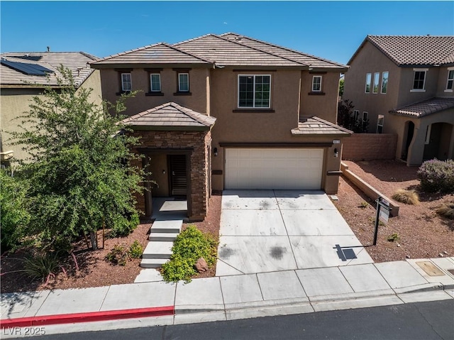 10373 Northern Hills Ave, Las Vegas, NV 89166 - view of front of house with an attached garage, stucco siding, concrete driveway, stone siding, and a tile roof