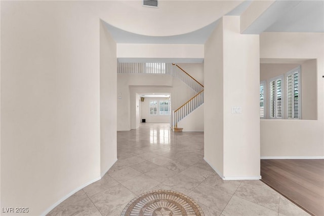 1155 Phillip Island St, Henderson, NV 89052 - hallway featuring stairs and light tile patterned floors