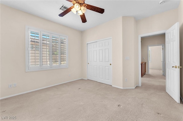 1155 Phillip Island St, Henderson, NV 89052 - unfurnished bedroom with light colored carpet, a closet, and ceiling fan