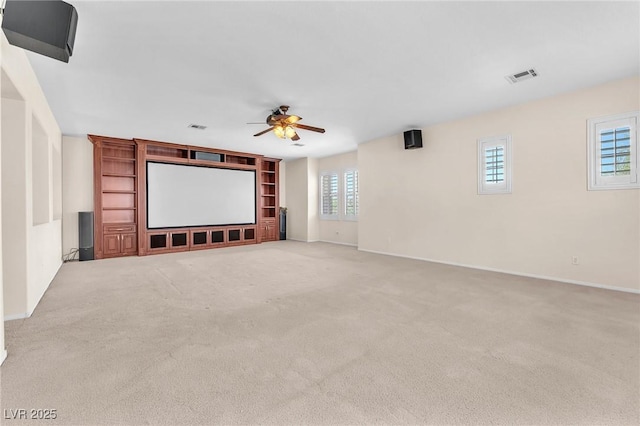 1155 Phillip Island St, Henderson, NV 89052 - home theater featuring a ceiling fan, carpet flooring, and built in shelves