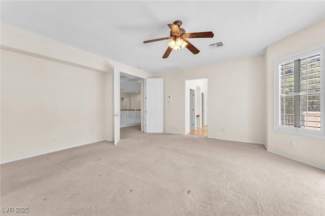 1155 Phillip Island St, Henderson, NV 89052 - unfurnished bedroom with light carpet and a ceiling fan