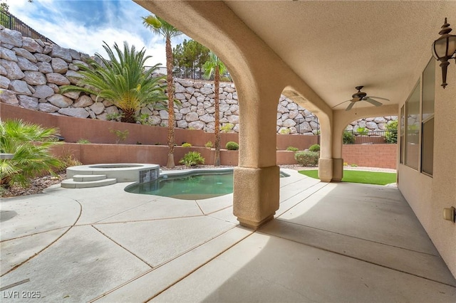 1155 Phillip Island St, Henderson, NV 89052 - view of swimming pool featuring ceiling fan, a fenced backyard, a patio area, and a pool with connected hot tub