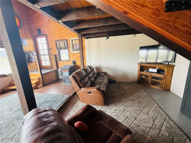 250 E Madison Ave, Ely, NV 89301 - living room featuring wooden walls, healthy amount of natural light, and beamed ceiling