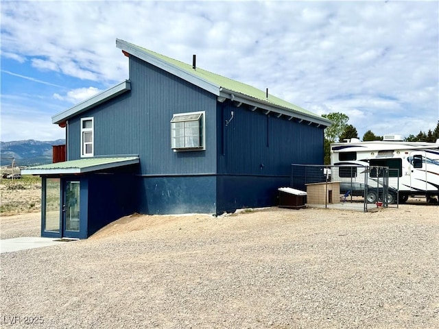 250 E Madison Ave, Ely, NV 89301 - view of home's exterior featuring metal roof