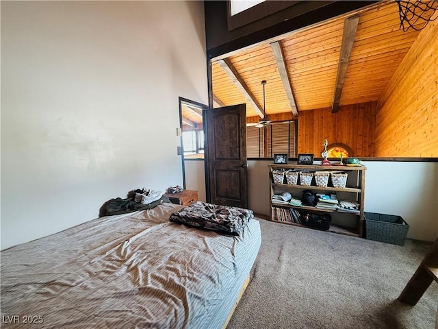 250 E Madison Ave, Ely, NV 89301 - bedroom featuring carpet floors, wooden walls, and wood ceiling with exposed beams