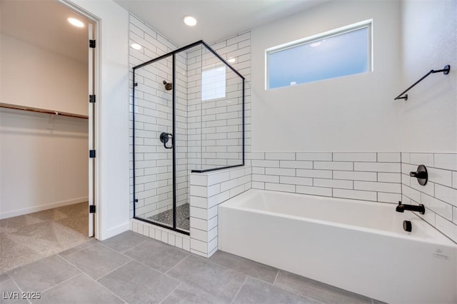 9265 Frazer St, Las Vegas, NV 89166 - full bath with a shower stall, a bath, a spacious closet, recessed lighting, and tile patterned floors