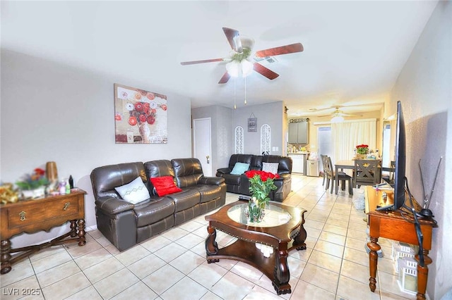 4145 Plumtree St, Las Vegas, NV 89115 - living area with a ceiling fan and light tile patterned flooring