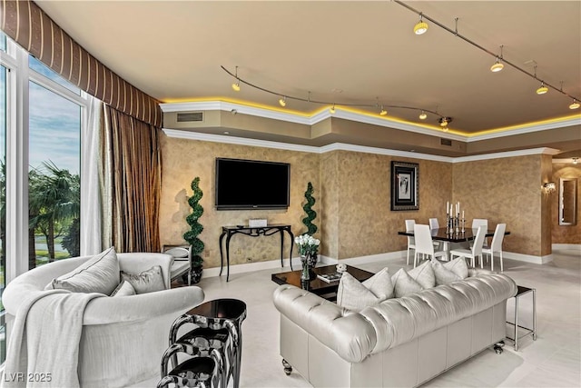 1 Hughes Center Dr Unit 308, Las Vegas, NV 89169 - living room with track lighting, crown molding, and baseboards