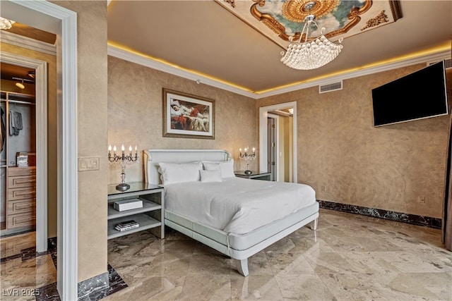 1 Hughes Center Dr Unit 308, Las Vegas, NV 89169 - bedroom featuring a chandelier, ornamental molding, and baseboards