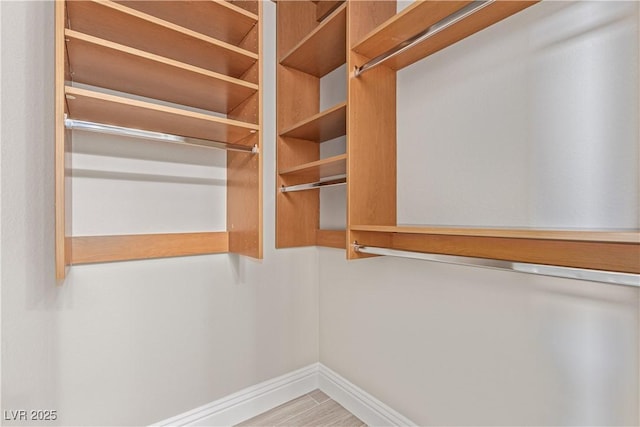5576 Buena Martina Way, Las Vegas, NV 89141 - walk in closet with wood finished floors