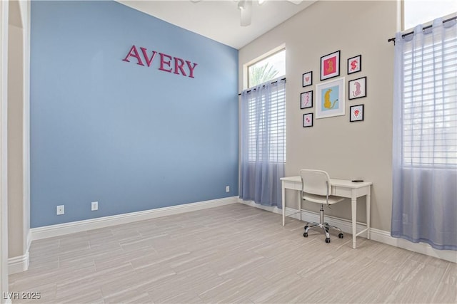 5576 Buena Martina Way, Las Vegas, NV 89141 - home office with a ceiling fan, wood finished floors, and baseboards