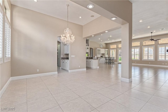 5576 Buena Martina Way, Las Vegas, NV 89141 - unfurnished room featuring a chandelier, recessed lighting, baseboards, light tile patterned floors, and ceiling fan