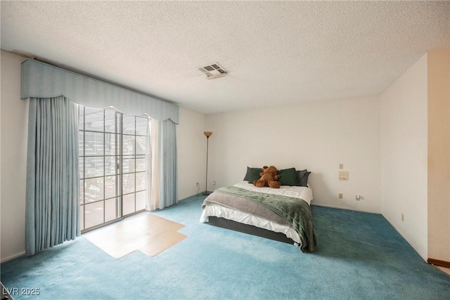 2004 Canterbury Dr, Las Vegas, NV 89119 - bedroom featuring carpet flooring and a textured ceiling