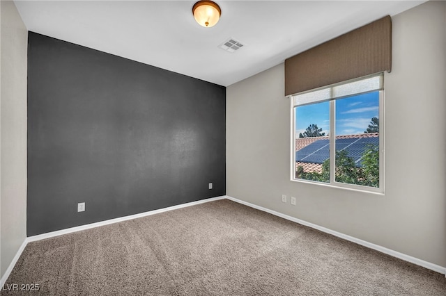 2449 Daks Loden Ct, Henderson, NV 89044 - carpeted spare room featuring baseboards