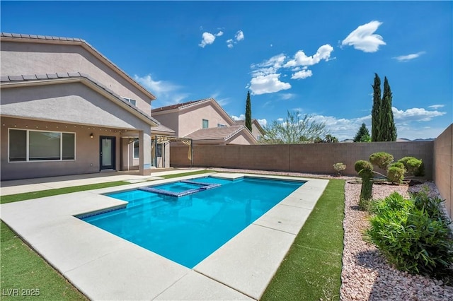 2449 Daks Loden Ct, Henderson, NV 89044 - view of swimming pool featuring a fenced backyard, a patio, and a pool with connected hot tub