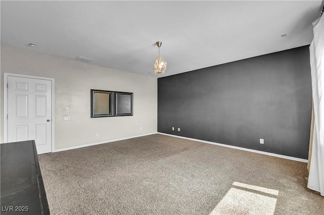 2449 Daks Loden Ct, Henderson, NV 89044 - empty room with carpet, a chandelier, and baseboards