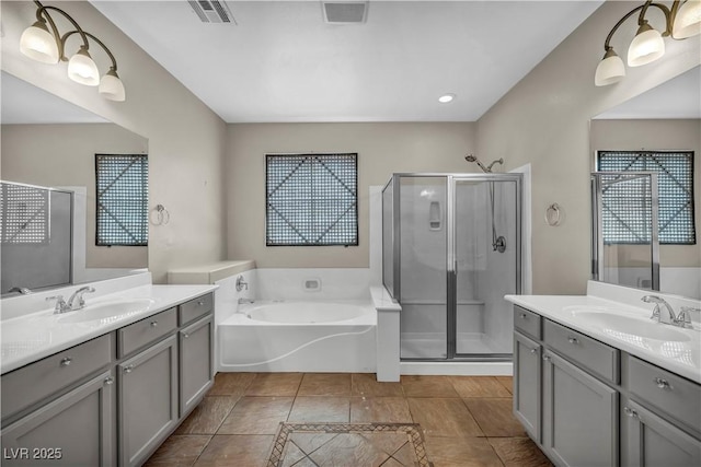 2449 Daks Loden Ct, Henderson, NV 89044 - bathroom with a stall shower, a garden tub, and two vanities