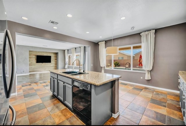 2449 Daks Loden Ct, Henderson, NV 89044 - kitchen featuring black dishwasher, a sink, freestanding refrigerator, plenty of natural light, and recessed lighting