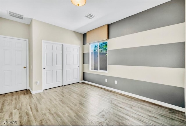 2449 Daks Loden Ct, Henderson, NV 89044 - unfurnished bedroom featuring wood finished floors, baseboards, and a closet